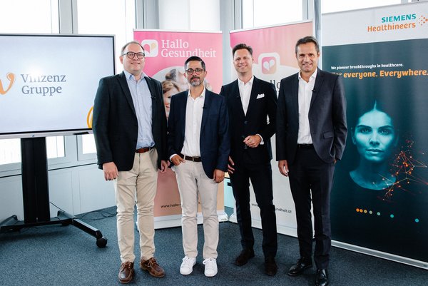 Gruppenfoto mit vier Männern